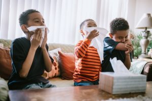 three-children-sneezing-and-blowing-their-noses