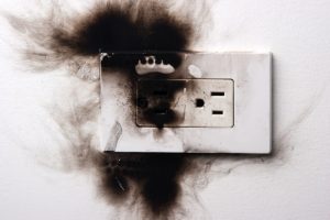 scorch-marks-on-an-outlet-plate